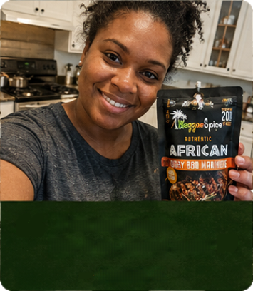 Hannah holding a pouch of Reggae Spice marinade in her kitchen